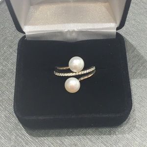 Pearl and white sapphire rose gold and silver ring